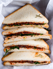 Sticker - Sandwiches with chicken ham, ground beef, tomatoes and greens.