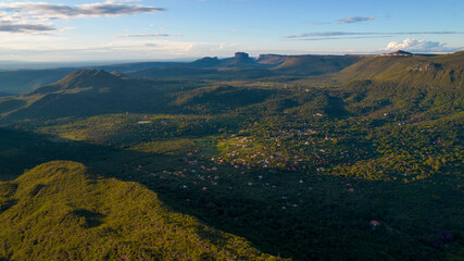 Village of capon partially covered by the shadow of the hill of the Hawk, Pedra do Gavião in Chapada Diamantina