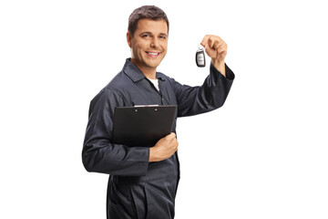Wall Mural - Auto mechanic holding a clipboard and car keys