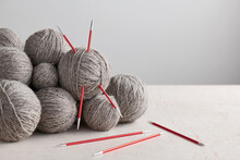 Double Pointed Knitting Needles And Balls Of Yarn