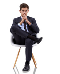 Wall Mural - Business man, job thinking and sitting portrait isolated on a transparent, png background. Corporate, male professional and young worker with ideas and inspiration for success ready for work in suit