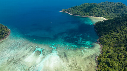  The tropical seashore island in a coral reef ,blue and turquoise sea Amazing nature landscape