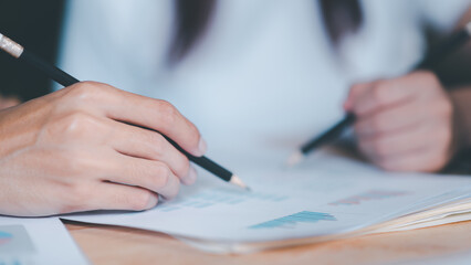 Aufkleber - statistical analyst reading graph report and business statistics charts ,Analysis and improvement of corporate strategy ,manage financial and marketing documents ,Statistics and Data