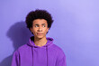 © deagreez - Photo of serious minded youngster guy looking suspicious empty space thoughts hmm distrust politician isolated on violet color background
