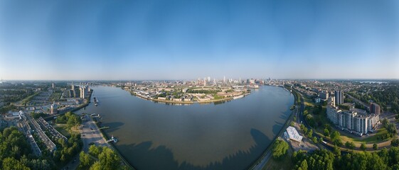 Wall Mural - Drone panorama over Dutch city Rotterdam at sunrise