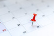 © PBXStudio - Red push pin on calendar 31st day of the month, new year eve