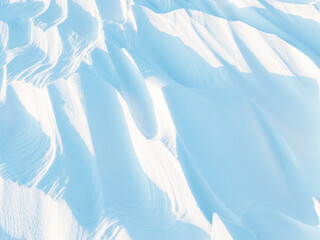 Snow texture. Wind sculpted patterns on snow surface. Wind in the tundra and in the mountains on the surface of the snow sculpts patterns and ridges (sastrugi). Arctic, Polar region. Winter background