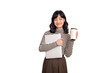 © Jirawatfoto - Beautiful smiling young asian businesswoman carrying laptop computer and cup of coffee to go while standing isolated over white background - PNG format