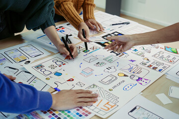 team of creative web, graphic designer planning, drawing website ux ui app for mobile phone applicat