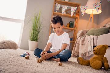 Sticker - Photo of adorable cute boy sitting floor in play room home have free time make words with abc blocks