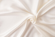 Beautiful Delicate Beige Satin Background With Soft Pleats For Wedding Or Festive Design.