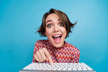 Photo Of Excited Funky Woman Dressed Print Top Typing Modern Gadget Keyboard Isolated Blue Color Background