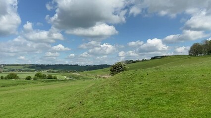 Wall Mural - Brede valley Winchelsea, East Sussex, UK - sky and clouds fields farms and Brede valley, up to hill in Winchelsea, East Sussex UK