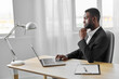 © SHOTPRIME STUDIO - freelancer man laptop american education office online computer student person job african