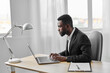 © SHOTPRIME STUDIO - man laptop computer office online student freelancer education job american african male