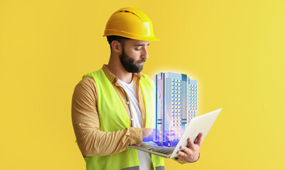 Wall Mural - Male construction worker with laptop and new digital project of modern residential building on yellow background