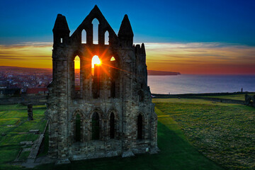 Wall Mural - Sun Glare through the windows of Whitby Abbey