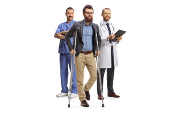 Sticker - Medical team with a male patient standing with crutches