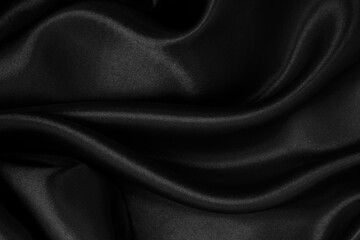 Wall Mural - Smooth elegant black silk or satin luxury cloth texture as abstract background. Luxurious background design