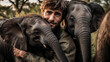 Człowiek przyjaźń ze słoniami na sawannie