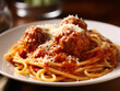 © Noah - A classic spaghetti and meatballs dish with a rich tomato sauce and grated Parmesan cheese.