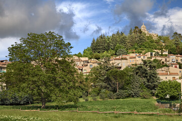 Wall Mural - Forcalquier, Provence-Alpes-Cote d’Azur, France: landscape of the village with the ancient Citadelle on the hill