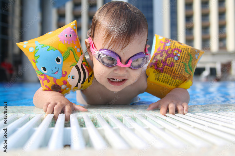 Baby in swimming pool Stock Photo | Adobe Stock