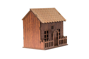 wooden miniature house isolated on the white background for real estate and construction concepts.