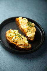 Wall Mural - Homemade scrambled eggs on toast