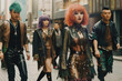 © ADDICTIVE STOCK - Generative AI illustration of confident group of young Asian friends in trendy warrior leather outfits standing in city street and looking at camera