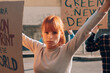 © Carlo Prearo - portrait of a proud young woman in a protest against climate change