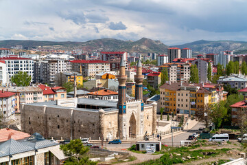 Wall Mural - Sivas, Turkey - May 7 2023: Panoramic view of Blue Madrasa from  Sivas castle
