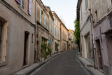 Fototapeta Uliczki - View on old streets and houses in ancient french town Arles, touristic destination with Roman ruines, Bouches-du-Rhone, France