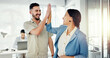 © SneakyPeakPoints/peopleimages.com - Office, high five and men greeting woman at work with smile walking in lobby of creative startup together. Hello, business friends and excited employees greet with hands, happy smile and friendship.