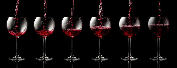 Wall Mural - Pouring red wine into a glass.