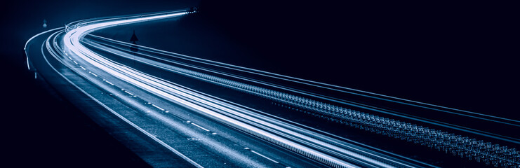 blue car lights at night. long exposure