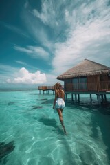 Wall Mural - Amazing drone view of the beach and water with beautiful colors. luxury tropical resort or hotel with water villas and beautiful beach scenery. maldives, summer vacation, resort maldivian houses.