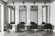 Light stylish barber shop with armchairs in row and mirror, accessories on table