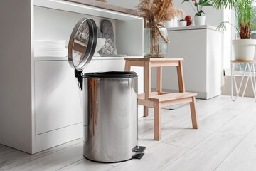 Canvas Print - Opened metallic trash bin in interior of modern kitchen