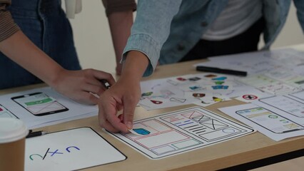 Wall Mural - close up ux developer and ui designer brainstorming interface wireframe design.creative digital deve