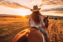 A Close - Up Shot Of A Young Woman Horse Riding In The Enchanting Golden Hour Of Sunset. Generative AI