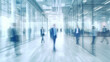 © Aram - Blurred business people in white glass office background. Generative AI