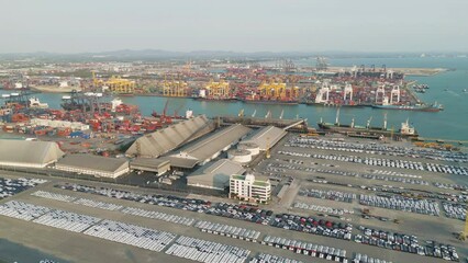 Wall Mural - Aerial view of container cargo ship in the export and import business and logistics international goods in urban city. Shipping to the harbour by crane in Bangkok harbour, Thailand.