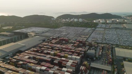 Wall Mural - Aerial view of container cargo ship in the export and import business and logistics international goods in urban city. Shipping to the harbour by crane in Bangkok harbour, Thailand.