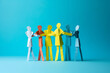 © ink drop - A group of paper people coming together. Community and friendship concept