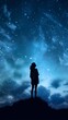 © BraveSpirit - Silhouette of a girl looks at the starry sky. Generative AI