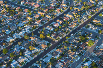 Wall Mural - Late afternoon aerial view of suburban neighborhood streets and homes near Los Angeles in Simi Valley, California.