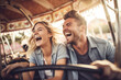 © Jasmina - Excited young couple enjoying a thrilling, high-speed ride in the amusement park