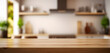 © Prasanth - Wooden table top on blur kitchen room background,Modern Contemporary kitchen room interior.