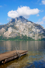 Wall Mural - Panoramic view of Traunstein at Traunsee lake during sunset, landscape photo of lake and mountains near Gmunden, Austria, Europe